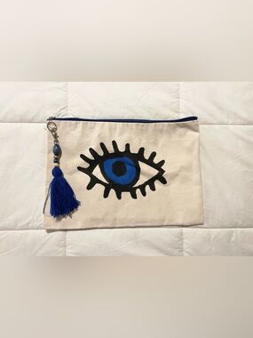 Canvas Eye Clutch with Blue Tassel